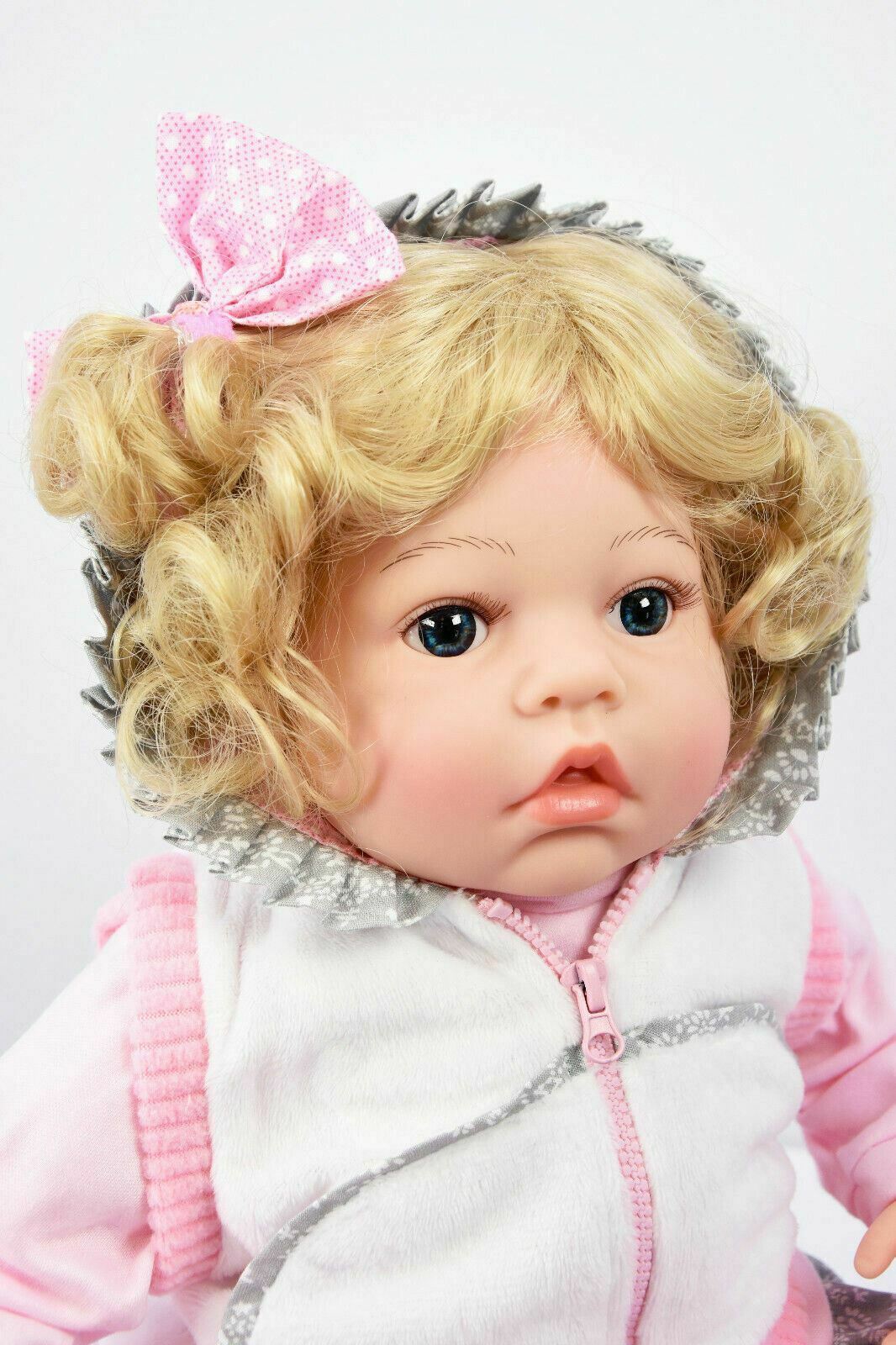 Baby Toddler Sitting Baby Doll with a white coat